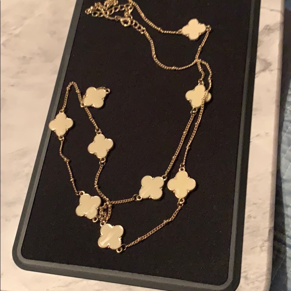 Long cream and gold necklace